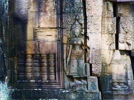 Stone carving at Banteay Kdei in Siem Reap, Cambodia photo
