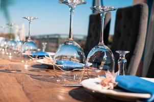 Wedding or event decoration table setup, blue details photo