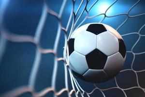 soccer ball in net with spotlight or stadium light background photo