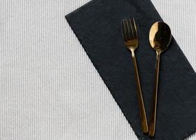 Empty plate with silver fork  and Spoon dining dish, copy space photo