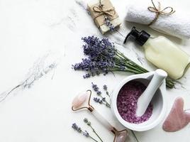 Flat lay composition with lavender flowers and natural cosmetic photo