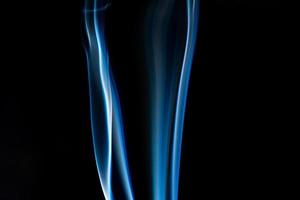 Blue smoke on black background, smoke abstract photo