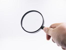 Magnifier in hand photo