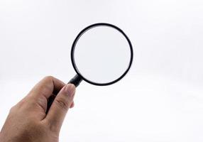 Magnifier in hand photo