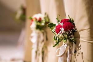 Wedding Decoration on the Chairs photo