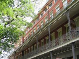 Bourbon Street at the French Quarter in New Orleans, Louisiana photo