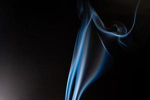 Blue smoke on black background, smoke abstract photo