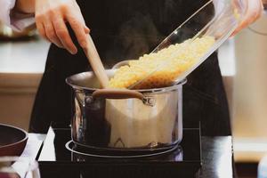 Chef preparing food in the kitchen, chef cooking, Chef decorating dish photo