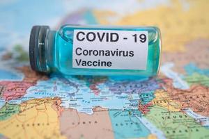 Coronavirus Covid-19 vaccine on Africa map photo