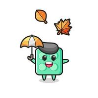 cartoon of the cute brick toy holding an umbrella in autumn vector