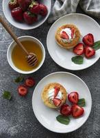 Cottage cheese pancakes, ricotta fritters on ceramic plate photo