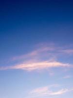 Fluffy clouds in the blue sky with morning light from the sunrise photo