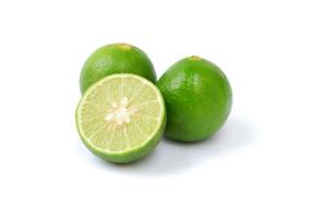 Lime with slices isolated on a white background photo