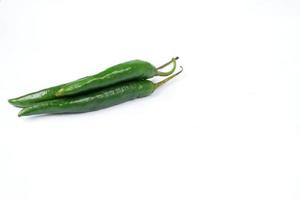 Green chili isolated on a white background photo