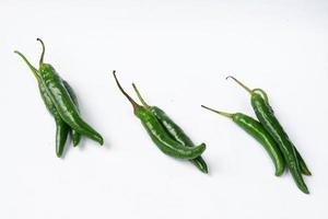 Green chili isolated on a white background photo