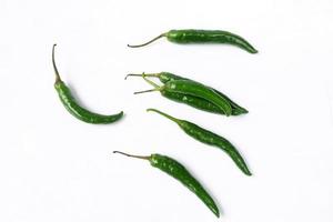 Green chili isolated on a white background photo