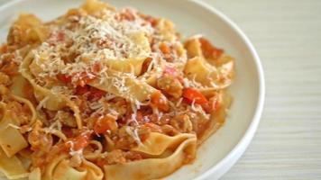 Homemade pasta fettuccine bolognese with cheese - Italian food style video
