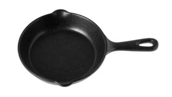 Iron black pan on white background photo