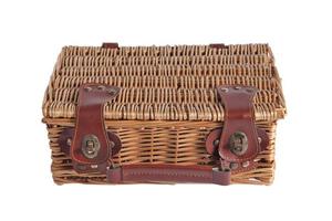 Wooden picnic wicker basket isolated on white background photo