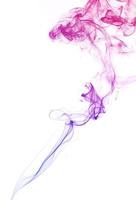 Smoke floating on white background photo