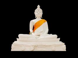 White Buddha isolated on black background photo