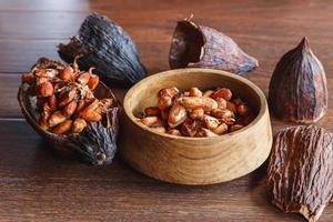 Dried cocoa pods and dried cocoa beans photo