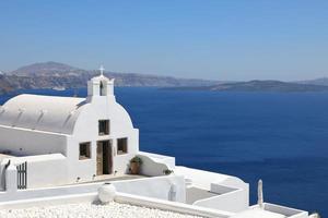 Hermosa vista de Oia en la isla de Santorini, Grecia foto