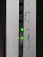 Ethernet and power green led on modem router photo