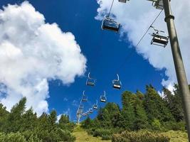 Chairlift for hikers in the summer season photo