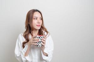 Portrait beautiful Asian woman holding coffee cup or mug photo