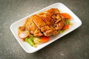 Teppanyaki chicken steak with cabbage and carrot photo