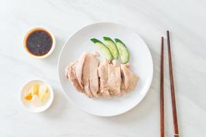 Hainanese chicken rice or rice steamed with chicken soup photo