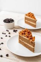 Coffee almonds cake on plate photo