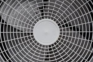 Close up of white air conditioner grille photo