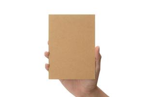 Hand holding blank cardboard paper isolated on white background photo