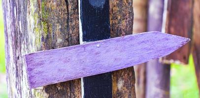 Colorful violet plain beach directional arrows on Ilha Grande Brazil. photo