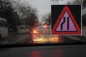 Colorful traffic warning and guidance signs made with LED lights.