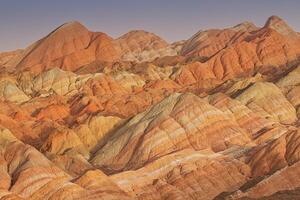 Zhangye, Danxia Landform in Gansu district, China. A geological of colorful sandstone layers is as known the rainbow mountain.