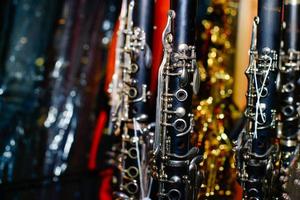 Clarinets in a shop window of musical instruments photo