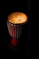 Percussione a djembe skin African percussion instrument photo