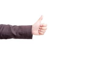 Thumbs up hand sign on white isolated background photo