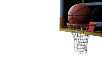 baloncesto entrando en el aro sobre fondo blanco aislado foto