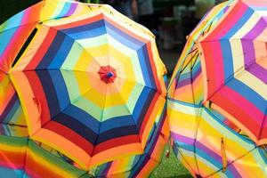 Multi color of opened umbrellas photo