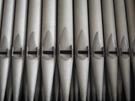 Pipes of a church pipe organ photo