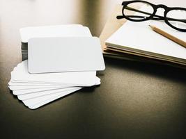 Blank corporate identity business card package on worker table