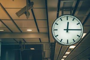Clock in railway station retro color tone photo