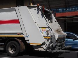 Rear side of a garbage truck for general waste photo