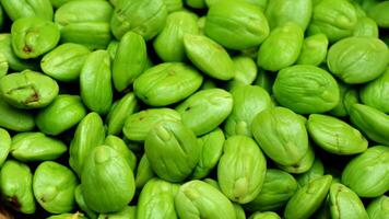 Petai, Bitter bean,  stink bean, Sato or Pakria in traditional market photo