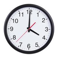 Office clock shows exactly four o'clock photo