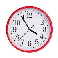 Five to four on round clock face photo